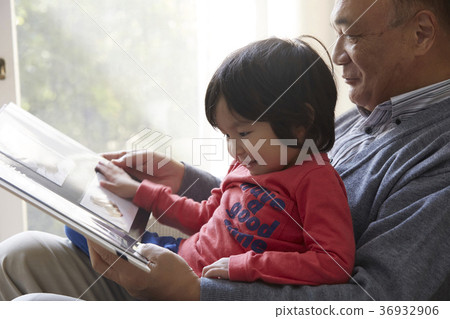 Senior playing with grandson 36932906