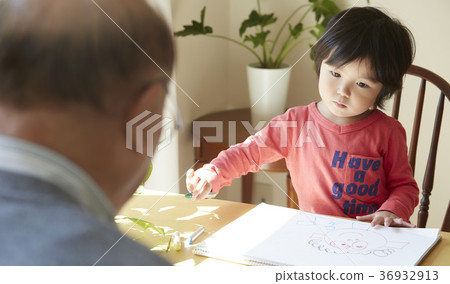 Senior playing with grandson 36932913