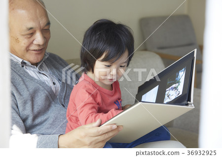 Senior playing with grandson 36932925
