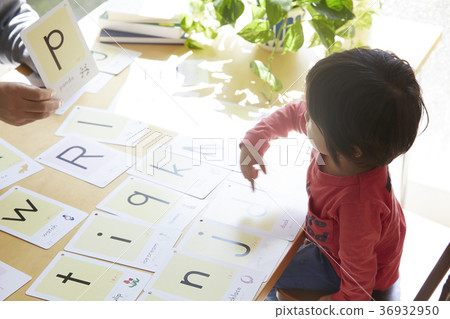 Senior with child studying Senior with child studying 36932950