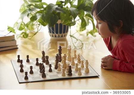 Children playing chess Children playing chess 36933005