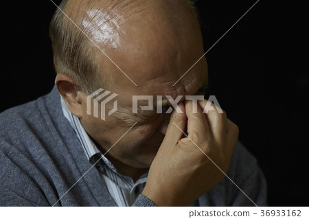Worried senior black back Worried senior black back 36933162