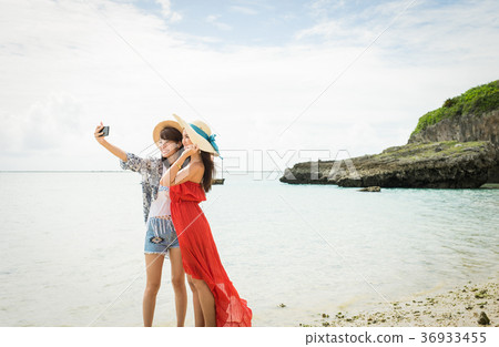Women traveling in Okinawa Women traveling in Okinawa 36933455