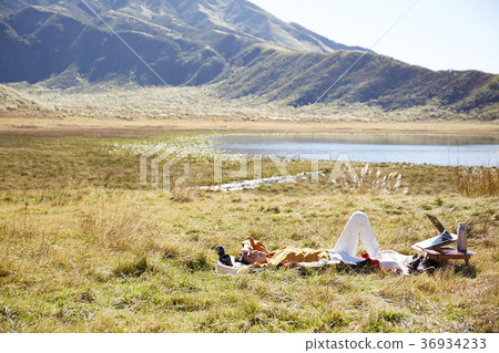 Woman working in the meadow 36934233