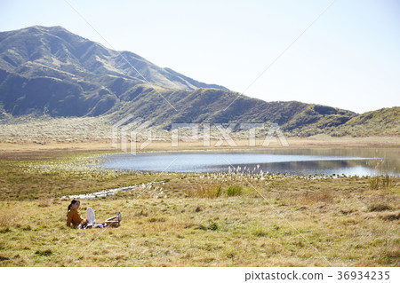 Woman working in the meadow Woman working in the meadow 36934235