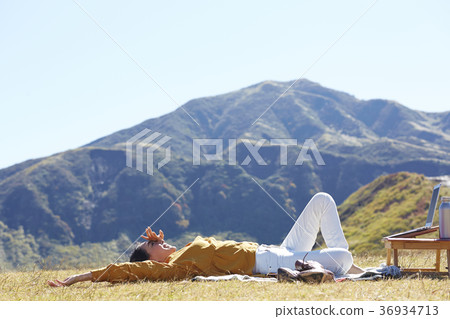 Woman working in the meadow 36934713