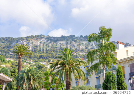 Daylight view to mountains and trees from city Daylight view to mountains and trees from city 36934735