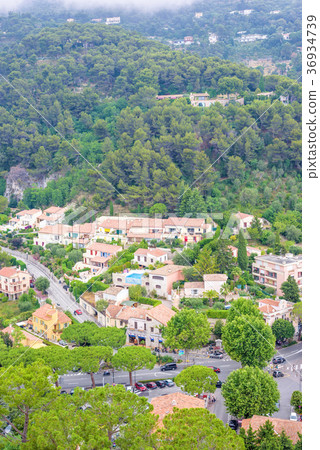 Daylight foggy view to Eze, Cote d'Azur village Daylight foggy view to Eze, Cote d'Azur village 36934739