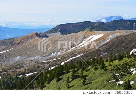 Mt. Kusatsu Shirane seen from national highway highest point and Yogahira of early summer 36935393
