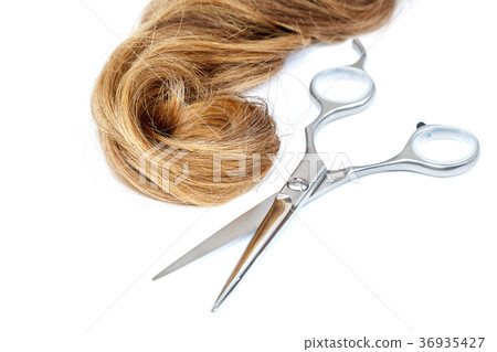 scissors and a lock of blond hair. scissors and a lock of blond hair. 36935427