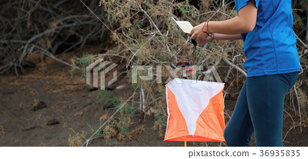 Girl at control point in the orientation run 36935835