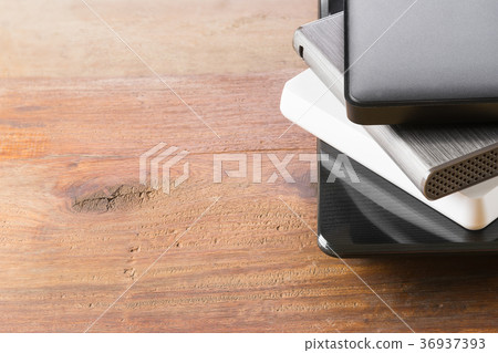 stack of portable external hard drive stack of portable external hard drive 36937393