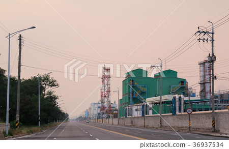 Empty road alongside the factories Empty road alongside the factories 36937534
