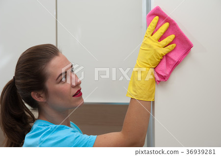 Charming woman doing cleaning Charming woman doing cleaning 36939281
