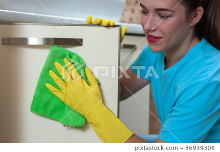 Charming woman doing cleaning 36939308