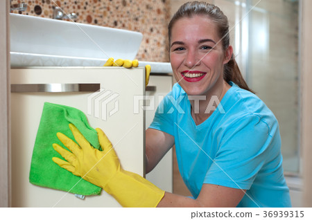 Charming woman doing cleaning 36939315