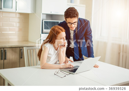 Couple enjoying time together browsing laptop. man Couple enjoying time together browsing laptop. man 36939326