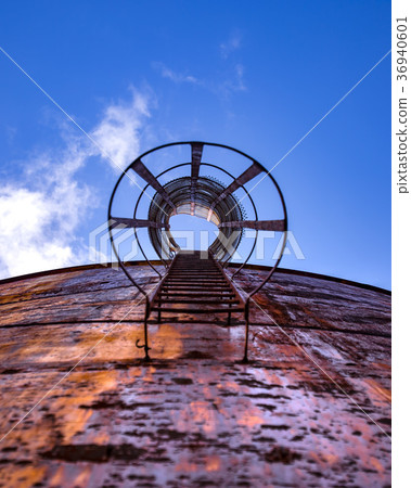 Abandoned water tower with ladder Abandoned water tower with ladder 36940601