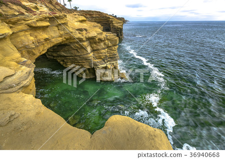 Caves on the coast of Point Loma with high Caves on the coast of Point Loma with high 36940668