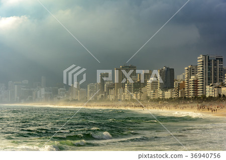 Dark clouds coming over Ipanema 36940756