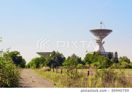 Large satellite dish radar antenna station field 36940799