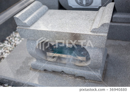 visiting a grave, grave, tomb 36940880