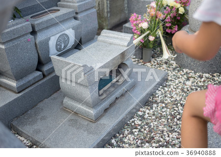 visiting a grave, younger, tomb 36940888