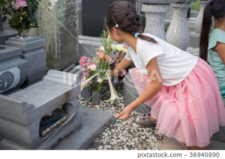 visiting a grave, younger, tomb 36940890