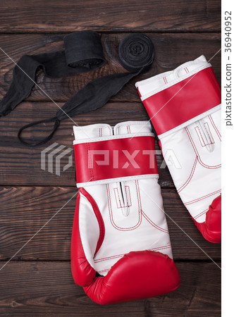pair of boxing gloves and black bandage pair of boxing gloves and black bandage 36940952