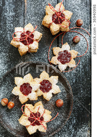 Traditional linzer cookies with berry jam. 36940998