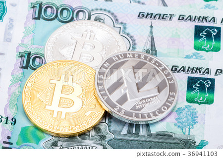 Coins of Cryptocurrency lying on the russian ruble Coins of Cryptocurrency lying on the russian ruble 36941103