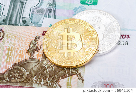 Physical version of Bitcoin lying on the ruble 36941104