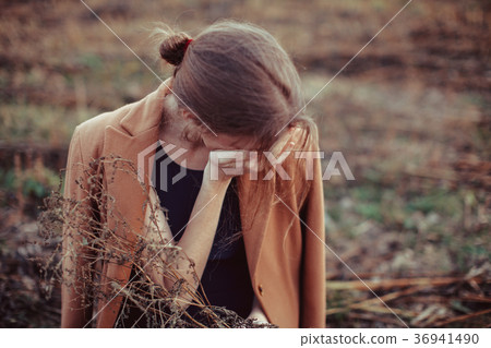 Lonely girl on a walk Lonely girl on a walk 36941490