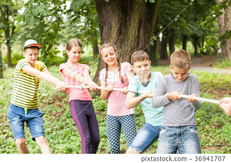 Tug-of-war in park Tug-of-war in park 36941707
