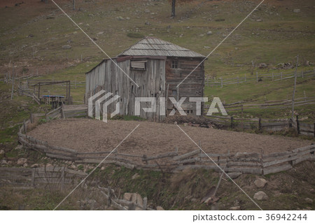 old wooden houses in a mountain, Georgian village old wooden houses in a mountain, Georgian village 36942244