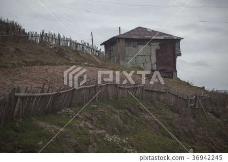old wooden houses in a mountain, Georgian village old wooden houses in a mountain, Georgian village 36942245