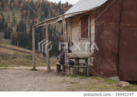 old wooden houses in a mountain, Georgian village 36942247