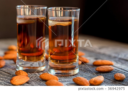 Italian amaretto liqueur with dry almonds 36942975