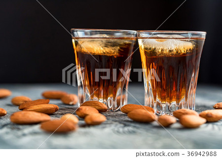 Italian amaretto liqueur with dry almonds 36942988