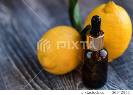 Dropper bottle of lemon essential oil 36942993