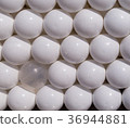 white plastic balls. background, texture. 36944881