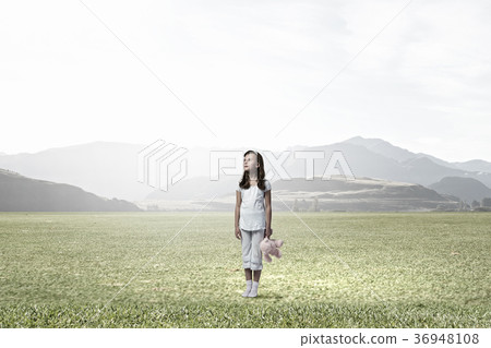 Little girl with bear 36948108