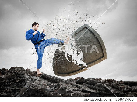 Karate man in blue kimino 36948406