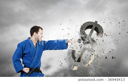 Karate man in blue kimino Karate man in blue kimino 36948413