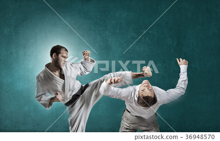 Karate man in white kimino Karate man in white kimino 36948570