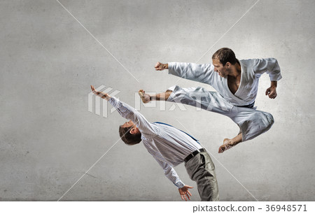 Karate man in white kimino Karate man in white kimino 36948571