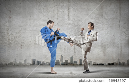 Karate man in blue kimino 36948597