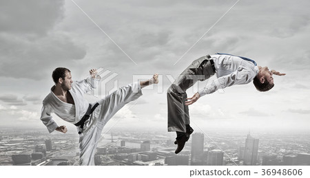 Karate man in white kimino Karate man in white kimino 36948606