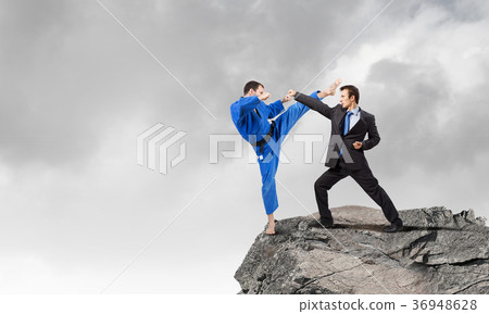 Karate man in blue kimino 36948628