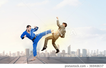 Karate man in blue kimino 36948637